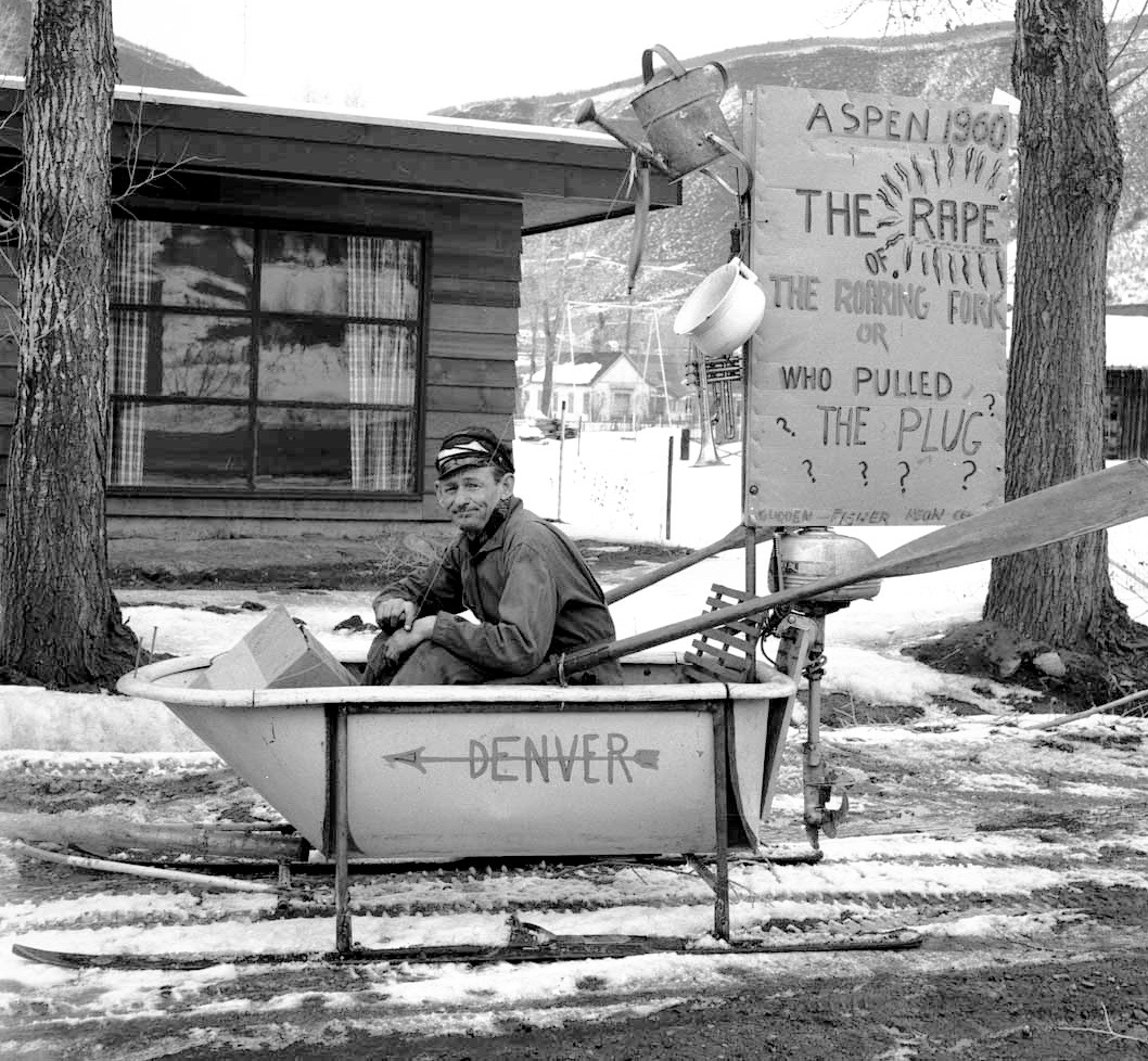 Freddie Fisher in his 1954 Winterskol float. Fisher was a professional musician who ran a ramshackle fix-it shop and yard in Aspen and sent in a regular stream of witty letters to The Aspen Times. In the mid-1950s, the proposed Fryingpan-Arkansas project was being reviewed at the local, state and federal level, and Aspenites were concerned about the amount of water that would be diverted from the Roaring Fork River watershed, on top of the amount already being diverted by the Twin Lakes-Independence Pass project. 